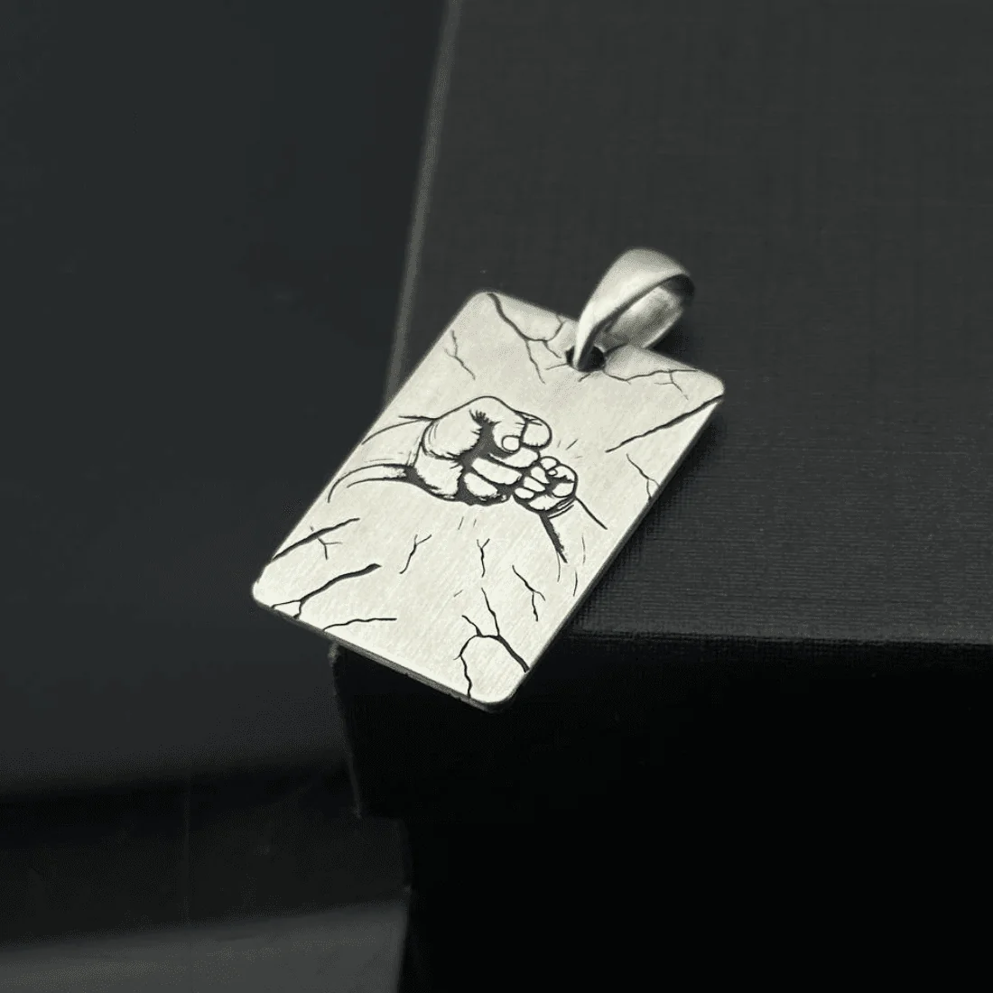 Срібний жетон з прикладом художнього гравіювання — демонстраційний зразок